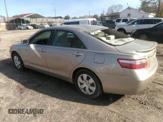 2007 Toyota Camry CE with VIN 4T1BE46K77U574068, listed as a IAAI auction lot 41934219 with 287,702 mi miles. Bid and sale history available at carsss.com. Image 3.