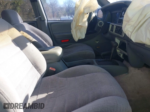 1996 Jeep Grand Cherokee Laredo with VIN 1J4GZ58S9TC268615, listed as a IAAI auction lot 41527984 with 248,443 mi miles. Bid and sale history available at carsss.com. Image 5.