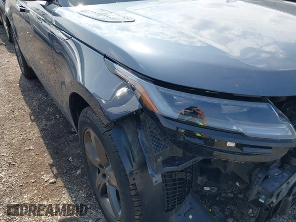 2025 Land Rover Range Rover Velar Dynamic SE with VIN SALYL2EX9SA809479, listed as a IAAI auction lot 42150495 with 7,038 mi miles and . Bid and sale history available at DreamBid. Image 1.