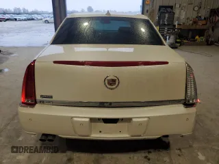 2009 Cadillac DTS 1SC z VIN 1G6KD57Y59U118737, wystawiony jako Copart lot #80776524 z przebiegiem 123 001 mil mil oraz Szkoda całkowita • Salvage title. Historia ofert i sprzedaży dostępna na DreamBid. Obrazek 6.