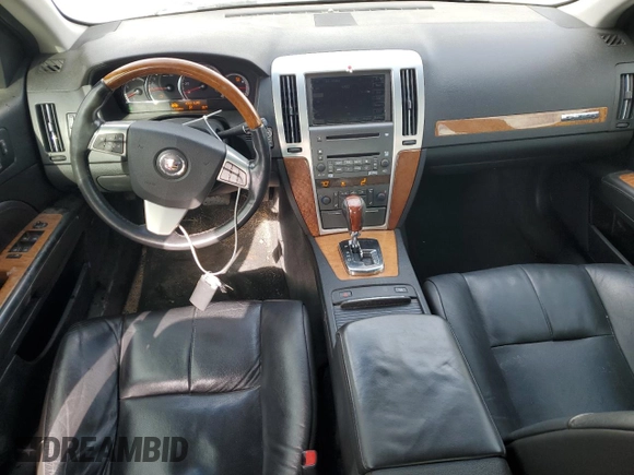 2010 Cadillac STS AWD z VIN 1G6DU6EV1A0150801, wystawiony jako Copart lot #42761515 z przebiegiem 154 865 mil mil oraz Szkoda całkowita • Salvage title. Historia ofert i sprzedaży dostępna na DreamBid. Obrazek 8.