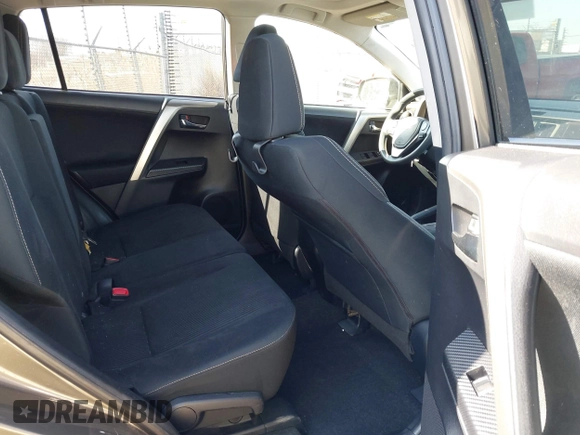 2014 Toyota RAV4 XLE with VIN JTMRFREV6ED084114, listed as a IAAI auction lot 41801049 with 140,042 mi miles and . Bid and sale history available at DreamBid. Image 8.