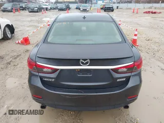 2015 Mazda 6 i Grand Touring with VIN JM1GJ1W56F1207077, listed as a IAAI auction lot 41734641 with 109,447 mi miles and . Bid and sale history available at DreamBid. Image 16.