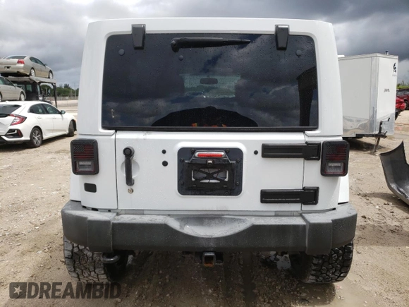 2015 Jeep Wrangler Unlimited Wrangler X with VIN 1C4BJWEG6FL614671, listed as a Copart auction lot 62286095 with 94,928 mi miles and Salvage title. Bid and sale history available at DreamBid. Image 6.