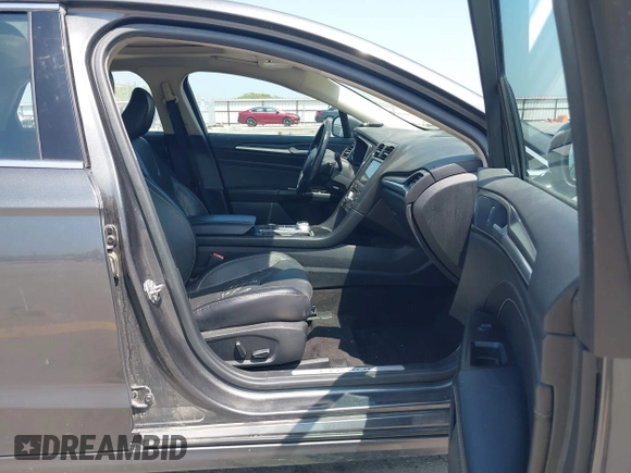 2020 Ford Fusion Titanium with VIN 3FA6P0D9XLR131042, listed as a IAAI auction lot 42560444 with 95,351 mi miles and . Bid and sale history available at DreamBid. Image 5.