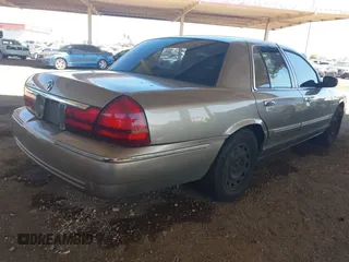 2004 Mercury Grand Marquis GS z VIN 2MEFM74W44X661154, wystawiony jako IAAI lot #42268675 z przebiegiem 236 456 mil mil oraz . Historia ofert i sprzedaży dostępna na DreamBid. Obrazek 4.