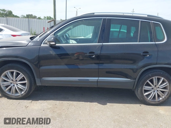 2012 Volkswagen Tiguan SE with VIN WVGAV7AX6CW521960, listed as a IAAI auction lot 42249355 with 118,496 mi miles and . Bid and sale history available at DreamBid. Image 14.