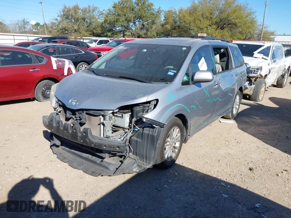 2014 Toyota Sienna XLE with VIN 5TDYK3DC7ES447903, listed as a IAAI auction lot 41835665 with 224,492 mi miles. Bid and sale history available at carsss.com. Image 19.