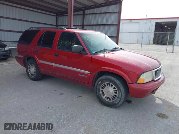 1999 GMC Jimmy SLE with VIN 1GKDT13W3X2504723, listed as a IAAI auction lot 41858184 with 239,227 mi miles. Bid and sale history available at carsss.com. Image 1.