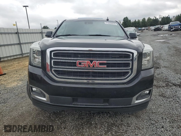 2018 GMC Yukon SLT with VIN 1GKS1BKC2JR314890, listed as a Copart auction lot 71433654 with 95,863 mi miles and Salvage Title. Bid and sale history available at DreamBid. Image 5.