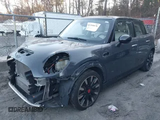 2016 MINI Cooper Hardtop 4 Door S with VIN WMWXU3C56G2B63682, listed as a IAAI auction lot 41244676 with 110,902 mi miles. Bid and sale history available at carsss.com. Image 18.