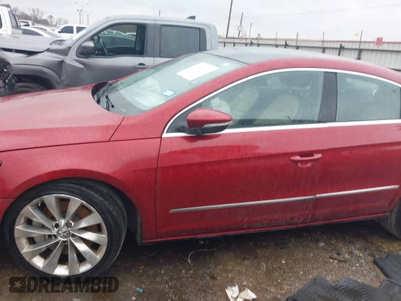 2013 Volkswagen CC VR6 Executive 4Motion with VIN WVWGU7AN9DE561506, listed as a IAAI auction lot 41459074 with 70,128 mi miles. Bid and sale history available at carsss.com. Image 13.