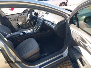 2016 Ford Fusion S z VIN 3FA6P0G76GR377005, wystawiony jako IAAI lot #42006585 z przebiegiem 100 575 mil mil oraz . Historia ofert i sprzedaży dostępna na DreamBid. Obrazek 5.