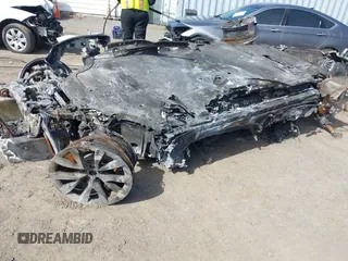2023 Tesla Model S z VIN 5YJSA1E59PF519768, wystawiony jako IAAI lot #41744097 z przebiegiem Nie podano mil oraz . Historia ofert i sprzedaży dostępna na DreamBid. Obrazek 2.