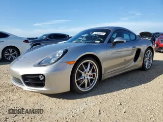 2014 Porsche Cayman S с VIN WP0AB2A89EK190939, выставлен на аукционе Copart как лот 73934334 с пробегом 22 719 миль миль и Списание • Salvage title. История ставок и продаж доступна на DreamBid. Изображение 1.