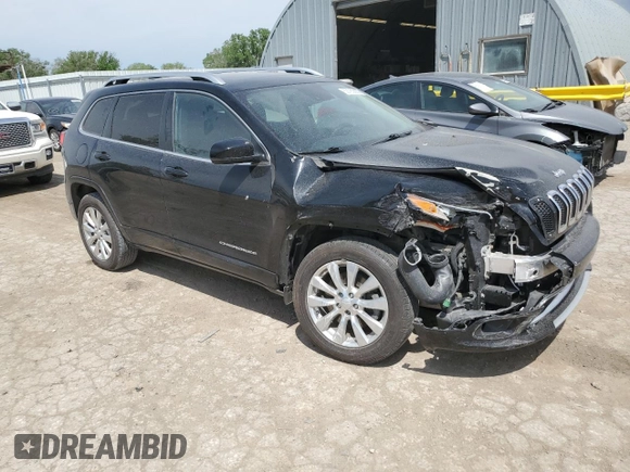 2018 Jeep Cherokee Overland with VIN 1C4PJMJX5JD525872, listed as a Copart auction lot 53783655 with 112,396 mi miles and Salvage title. Bid and sale history available at DreamBid. Image 4.