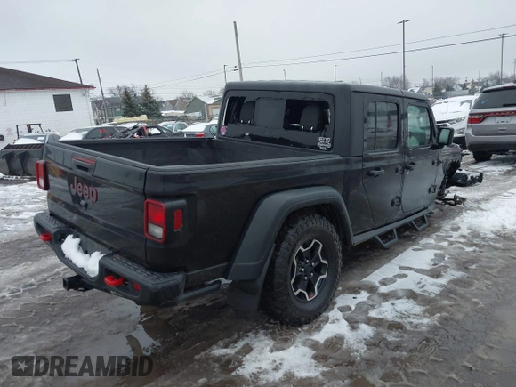 2021 Jeep Gladiator Rubicon z VIN 1C6JJTBG5ML605799, wystawiony jako IAAI lot #41190679 z przebiegiem 47 550 mil mil oraz . Historia ofert i sprzedaży dostępna na DreamBid. Obrazek 4.
