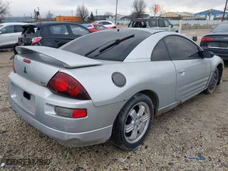 2000 Mitsubishi Eclipse GT with VIN 4A3AC54L3YE151312, listed as a IAAI auction lot 41724925 with 143,793 mi miles. Bid and sale history available at carsss.com. Image 4.
