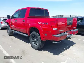 2011 Nissan Titan Pro-4X z VIN 1N6BA0ECXBN317554, wystawiony jako IAAI lot #42310942 z przebiegiem 152 264 mil mil oraz . Historia ofert i sprzedaży dostępna na DreamBid. Obrazek 3.