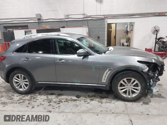 2017 Infiniti QX70 z VIN JN8CS1MU3HM143799, wystawiony jako IAAI lot #41554527 z przebiegiem 70 453 mil mil oraz . Historia ofert i sprzedaży dostępna na DreamBid. Obrazek 13.
