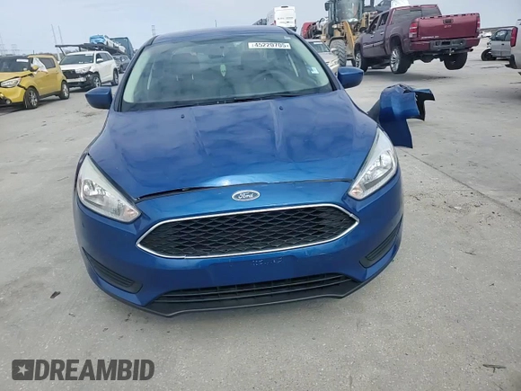 2018 Ford Focus SE z VIN 1FADP3F22JL328761, wystawiony jako Copart lot #45220705 z przebiegiem 71 639 mil mil oraz Szkoda całkowita • Salvage title. Historia ofert i sprzedaży dostępna na DreamBid. Obrazek 11.