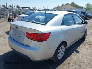 2010 Kia Forte EX with VIN KNAFU4A2XA5097831, listed as a IAAI auction lot 41872156 with 168,081 mi miles. Bid and sale history available at carsss.com. Image 4.