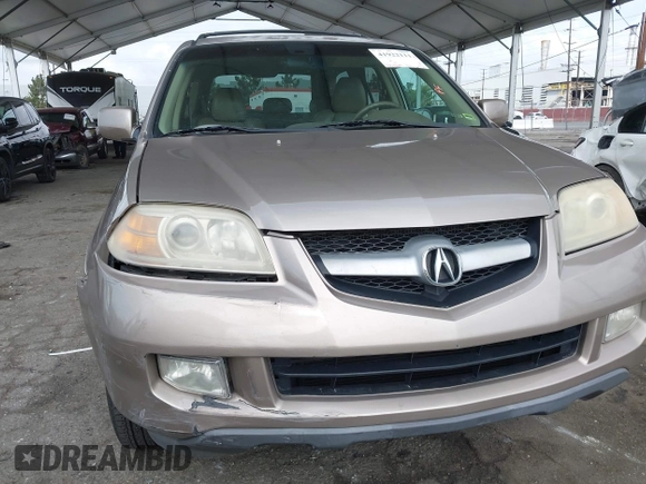 2004 Acura MDX Touring Pkg RES w/Nav with VIN 2HNYD18944H529592, listed as a IAAI auction lot 41922111 with 273,869 mi miles. Bid and sale history available at carsss.com. Image 6.