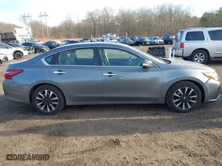 2018 Nissan Altima 2.5 SV with VIN 1N4AL3AP9JC166273, listed as a IAAI auction lot 41694295 with 83,864 mi miles. Bid and sale history available at carsss.com. Image 13.