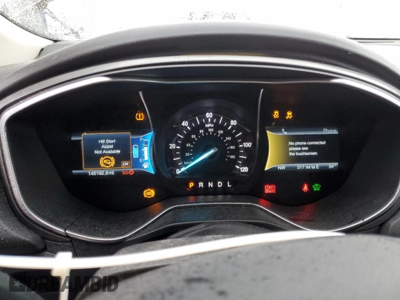 2016 Ford Fusion Titanium Hybrid z VIN 3FA6P0RU5GR356987, wystawiony jako Copart lot #48211775 z przebiegiem 145 192 mil mil oraz Szkoda całkowita • Salvage title. Historia ofert i sprzedaży dostępna na DreamBid. Obrazek 9.