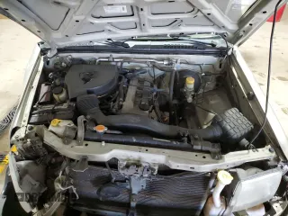 2000 Nissan Frontier XE with VIN 1N6DD26S8YC337811, listed as a Copart auction lot 54775915 with 129,427 mi miles and Salvage title. Bid and sale history available at DreamBid. Image 11.