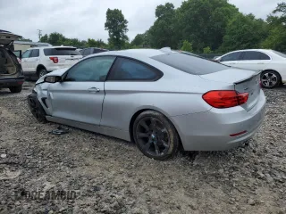 2015 BMW 4 Series 428i xDrive with VIN WBA3N5C59FK484702, listed as a Copart auction lot 61406785 with Not provided miles and Salvage title. Bid and sale history available at DreamBid. Image 2.