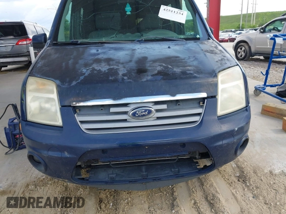 2011 Ford Transit Connect XLT with VIN NM0KS9BN2BT070324, listed as a IAAI auction lot 42511234 with 297,422 mi miles and . Bid and sale history available at DreamBid. Image 6.