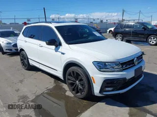 2020 Volkswagen Tiguan SE with VIN 3VV3B7AX8LM063202, listed as a IAAI auction lot 41731419 with 41,241 mi miles and . Bid and sale history available at DreamBid. Image 1.