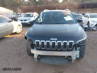 2020 Jeep Cherokee Latitude with VIN 1C4PJLCB0LD640328, listed as a IAAI auction lot 40801799 with 129,009 mi miles. Bid and sale history available at carsss.com. Image 6.