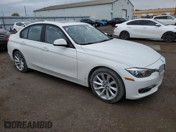 2013 BMW 3 Series 320i xDrive with VIN WBA3C3C59DF981328, listed as a Copart auction lot 57132395 with 152,458 mi miles and Salvage title. Bid and sale history available at DreamBid. Image 4.