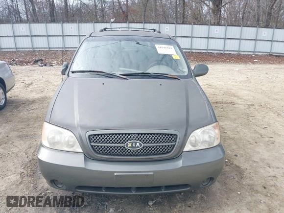 2004 Kia Sedona LX with VIN KNDUP131546543841, listed as a IAAI auction lot 41541012 with 112,122 mi miles. Bid and sale history available at carsss.com. Image 12.