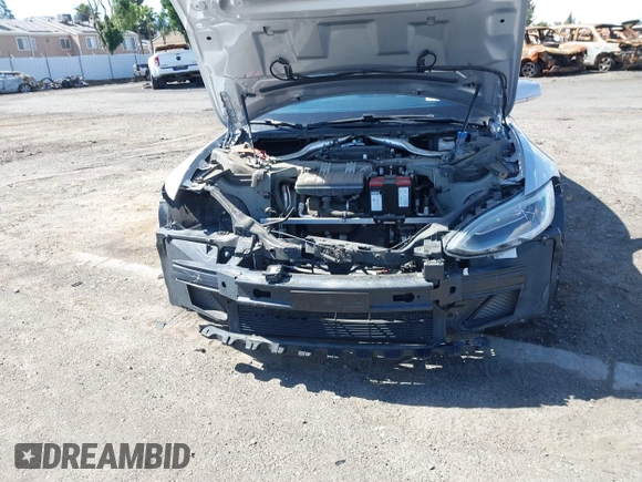 2016 Tesla Model S 90D with VIN 5YJSA1E22GF174637, listed as a IAAI auction lot 42234083 with 142,915 mi miles and . Bid and sale history available at DreamBid. Image 21.