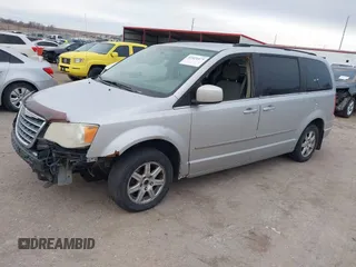 2010 Chrysler Town & Country Touring with VIN 2A4RR5D18AR466614, listed as a IAAI auction lot 41824475 with 242,881 mi miles. Bid and sale history available at carsss.com. Image 2.