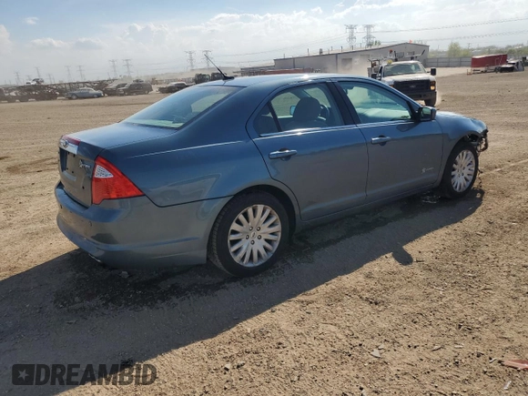 2012 Ford Fusion Hybrid z VIN 3FADP0L33CR288819, wystawiony jako Copart lot #56697025 z przebiegiem 65 486 mil mil oraz Szkoda całkowita • Salvage title. Historia ofert i sprzedaży dostępna na DreamBid. Obrazek 3.