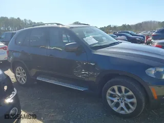 2011 BMW X5 35i with VIN 5UXZV4C51BL740731, listed as a IAAI auction lot 41771257 with 148,638 mi miles. Bid and sale history available at carsss.com. Image 13.