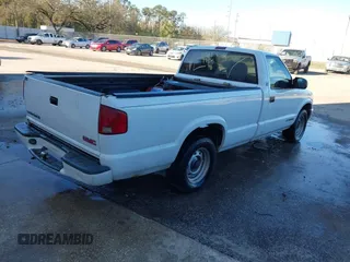 1999 GMC Sonoma with VIN 1GTCS1448XK513781, listed as a IAAI auction lot 41604322 with 216,174 mi miles. Bid and sale history available at carsss.com. Image 4.