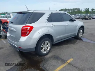 2017 Chevrolet Equinox LS with VIN 2GNALBEK6H1575339, listed as a IAAI auction lot 42041964 with 91,318 mi miles and . Bid and sale history available at carsss.com. Image 4.