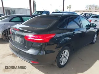 2015 Ford Focus SE with VIN 1FADP3F25FL330463, listed as a IAAI auction lot 41755867 with 72,725 mi miles. Bid and sale history available at carsss.com. Image 4.