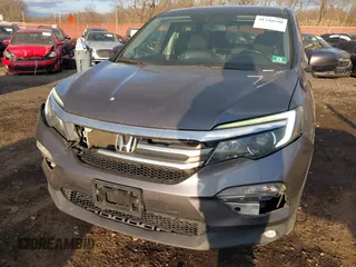 2016 Honda Pilot EX-L with VIN 5FNYF6H75GB053780, listed as a IAAI auction lot 41340590 with 203,190 mi miles. Bid and sale history available at carsss.com. Image 17.
