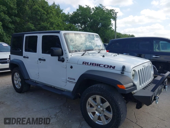 2016 Jeep Wrangler Unlimited Sport RHD z VIN 1C4BJWKG3GL293694, wystawiony jako IAAI lot #42569773 z przebiegiem 140 243 mil mil oraz . Historia ofert i sprzedaży dostępna na DreamBid. Obrazek 13.