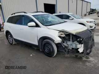 2015 Mazda CX-9 Touring with VIN JM3TB2CAXF0452576, listed as a Copart auction lot 88972245 with 148,152 mi miles and Salvage Title. Bid and sale history available at carsss.com. Image 4.