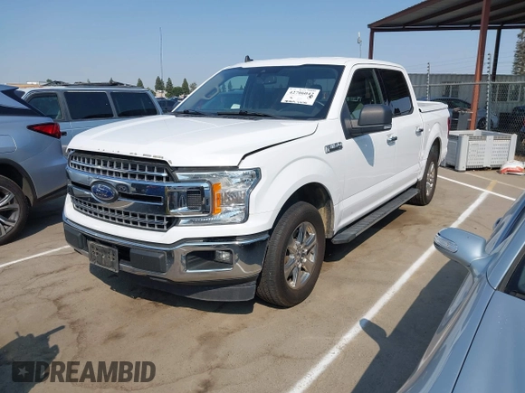 2019 Ford F-150 XL with VIN 1FTEW1C44KKC60773, listed as a IAAI auction lot 42706042 with 185,864 mi miles and . Bid and sale history available at DreamBid. Image 2.