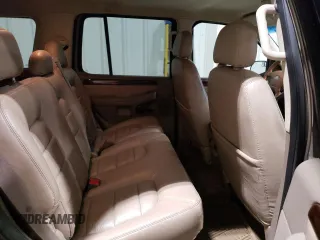 2003 Ford Explorer Limited z VIN 1FMZU75K43UC24704, wystawiony jako Copart lot #58601065 z przebiegiem 104 772 mil mil oraz Tytuł czysty. Historia ofert i sprzedaży dostępna na DreamBid. Obrazek 11.