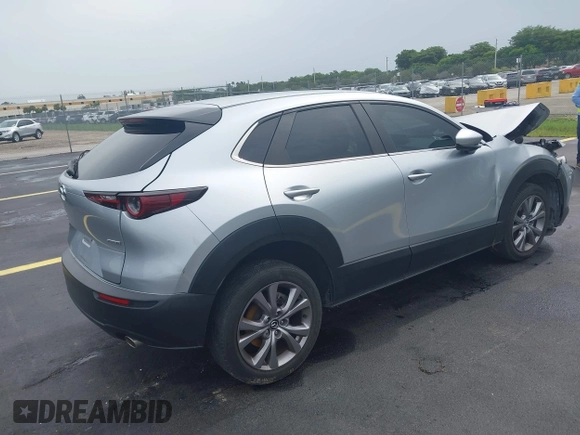 2021 Mazda CX-30 Select with VIN 3MVDMBBLXMM246600, listed as a IAAI auction lot 42418629 with 77,713 mi miles and . Bid and sale history available at DreamBid. Image 4.