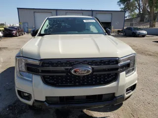 2025 Ford Ranger XLT z VIN 1FTER4HH9SLE14313, wystawiony jako Copart lot #59597415 z przebiegiem 1 231 mil mil oraz Szkoda całkowita • Salvage title. Historia ofert i sprzedaży dostępna na DreamBid. Obrazek 5.
